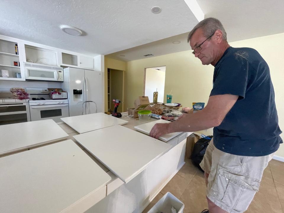 Volunteer Rick Walker spent Saturday remodeling a kitchen at the “Rincon Home,” an independent living dwelling in Apple Valley that will soon welcome a group of senior women. The home is provided by the nonprofit Ruth and Naomi Project.