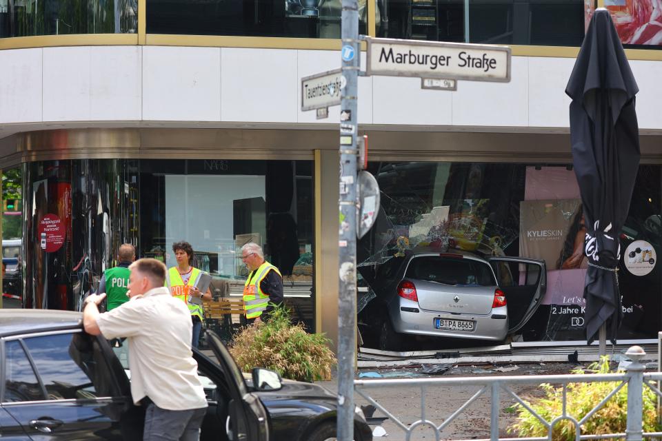 View of the car that crashed into a group of people before hitting a storefront at Tauentzienstrasse in Berlin (REUTERS)