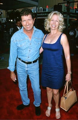 Mac Davis and Lovely Galpal at the Mann's Village Theatre premiere of Warner Brothers' Space Cowboys