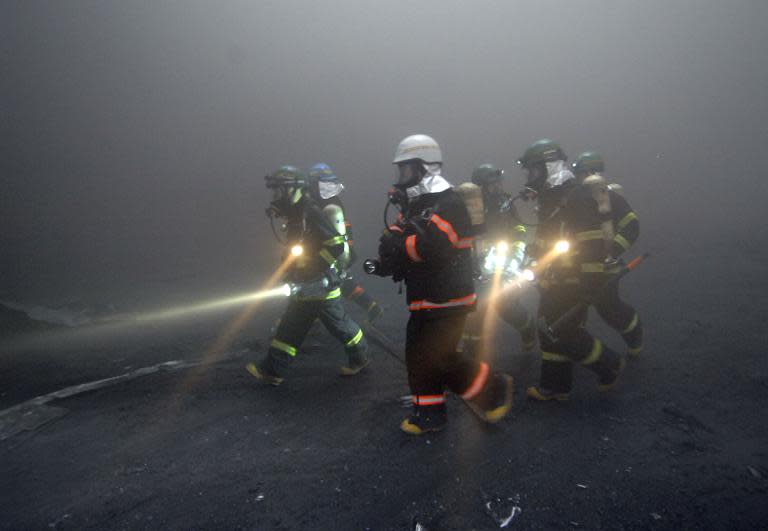 File photo of South Korean firefighters, pictured in Icheon, south of Seoul, on January 7, 2008