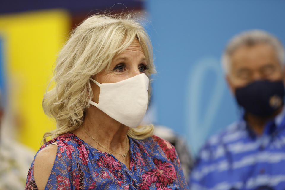 First lady Jill Biden tours a COVID-19 vaccination clinic at a high school in Waipahu, Hawaii, Sunday, July 25, 2021. (AP Photo/Caleb Jones)