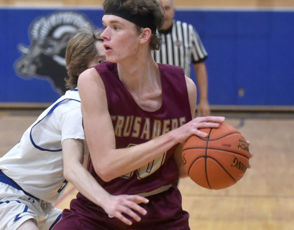 Upper Cape Tech's Patrick Accord covers Cape Tech's Josh Wiggins as he looks for an outlet pass as Upper Cape Tech played host to Cape Cod Tech in Bourne in this Jan. 21 game action.