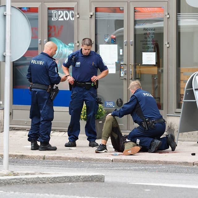 Police at the scene of a stabbing in Turku, Finland.