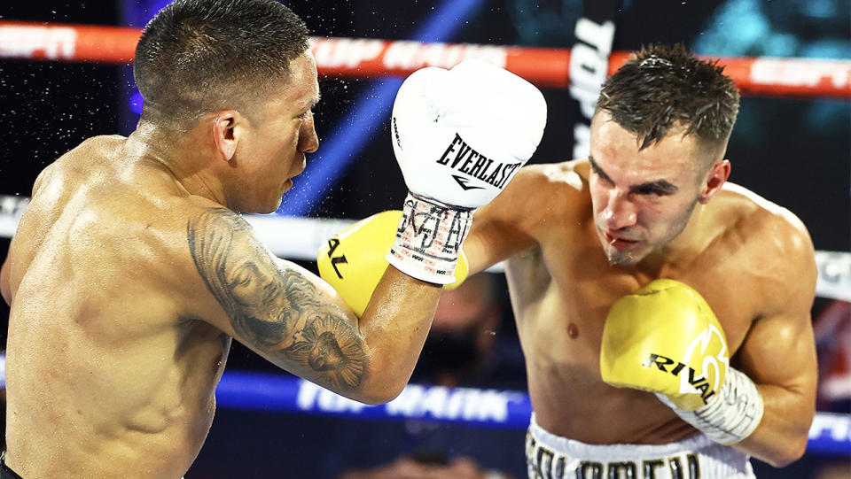 Aussie Andrew Moloney punches Joshua Franco during their WBA Super-Flyweight World Title fight. (Photo by Mikey Williams/Top Rank via Getty Images)