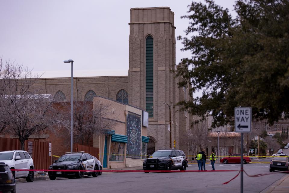 El Paso police officers block a street next to First Baptist Church during the investigation into a stabbing that wounded two men on Tuesday, Feb.6, 2024, in Central El Paso.