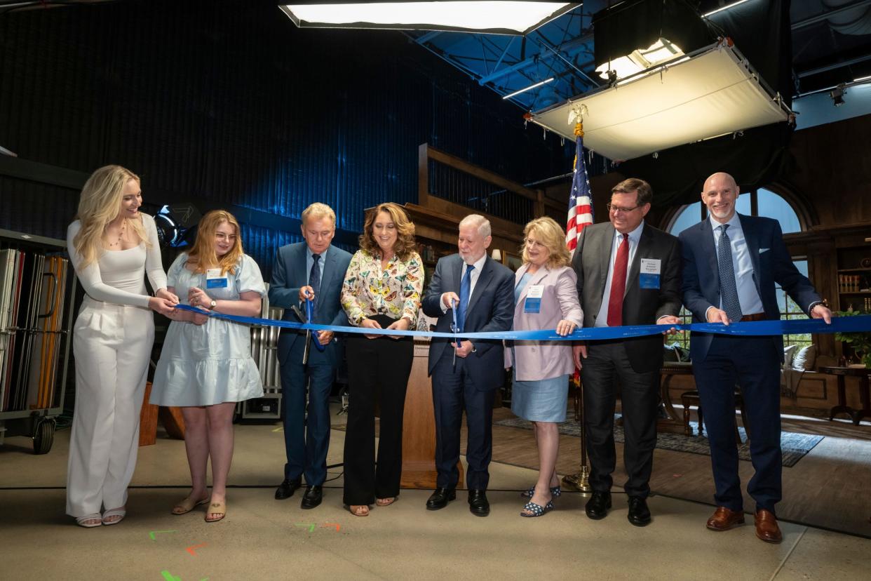 Pat Sajak and Hillsdale College President Larry Arnn cut a ribbon May 10 to signify the grand opening of the Sajak Visual Media Center.