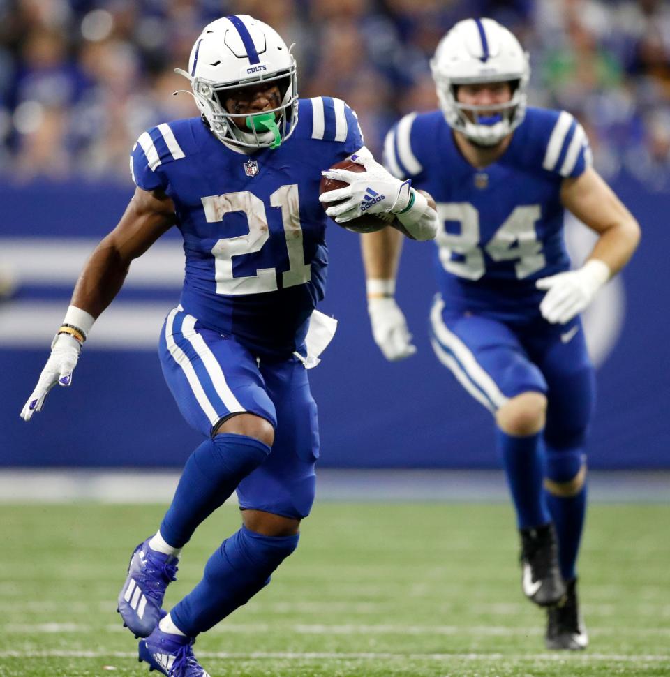 Indianapolis Colts running back Nyheim Hines (21) rushes the ball Thursday, Nov. 4, 2021, during a game against the New York Jets at Lucas Oil Stadium in Indianapolis.