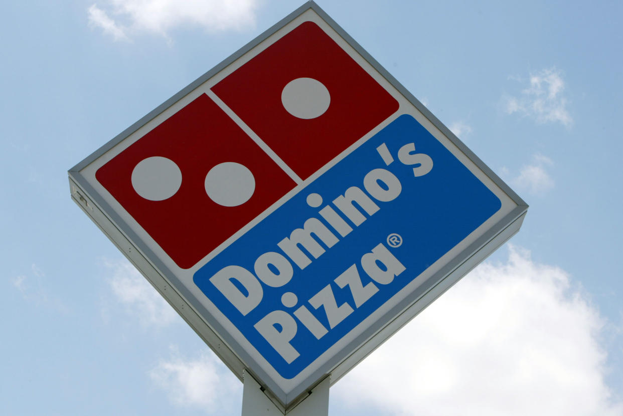 Members of a family in the U.K. staged a sit-in protest at their Domino’s, saying their delivery was “stone cold.” (Photo: Joe Raedle/Getty Images)