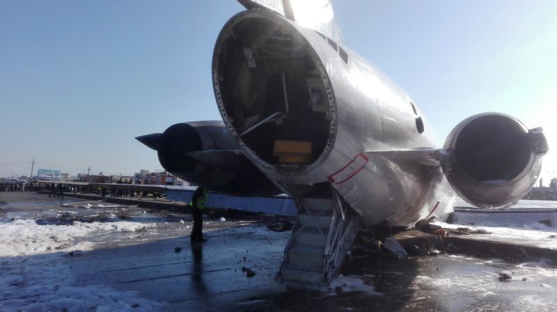 Iranian passenger plane is seen after sliding off the runway upon landing at Mahshahr airport