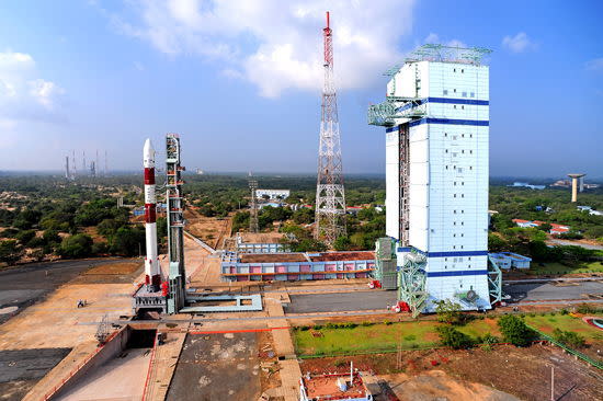 This panoramic view shows India's PSLV-C20 rocket on the First Launch Pad with the Mobile Service Tower at a distance. The rocket will launch seven satellites into orbit on Feb. 25, 2013, from the Satish Dhawan Space Centre in Sriharikota, Indi