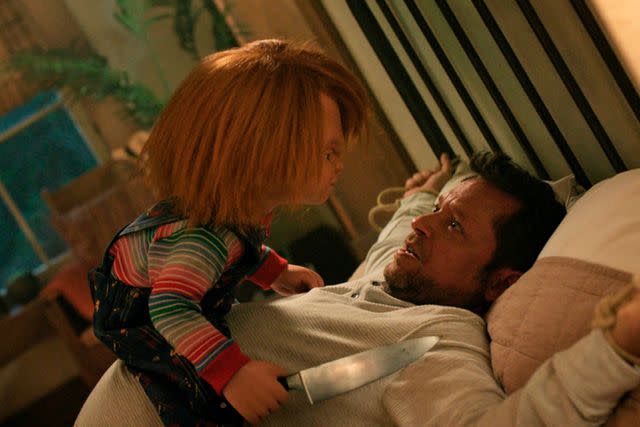 <p>SYFY</p> Alex Vincent as Andy Barclay with Chucky in season 3 of <em>Chucky</em> (2023)