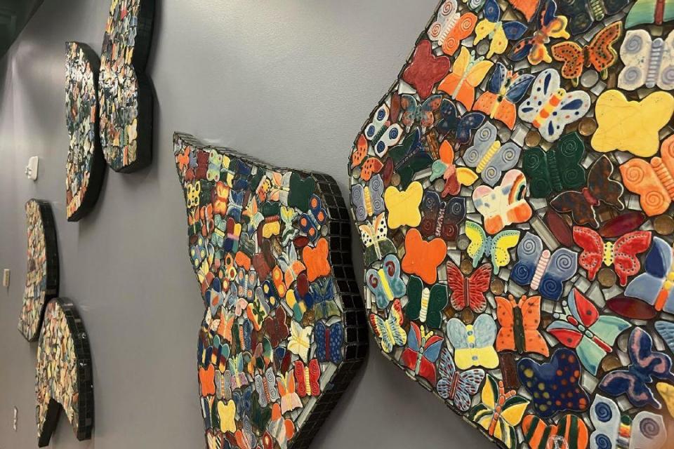 Mosaics made from small butterflies created to honor the children killed during the Holocaust.