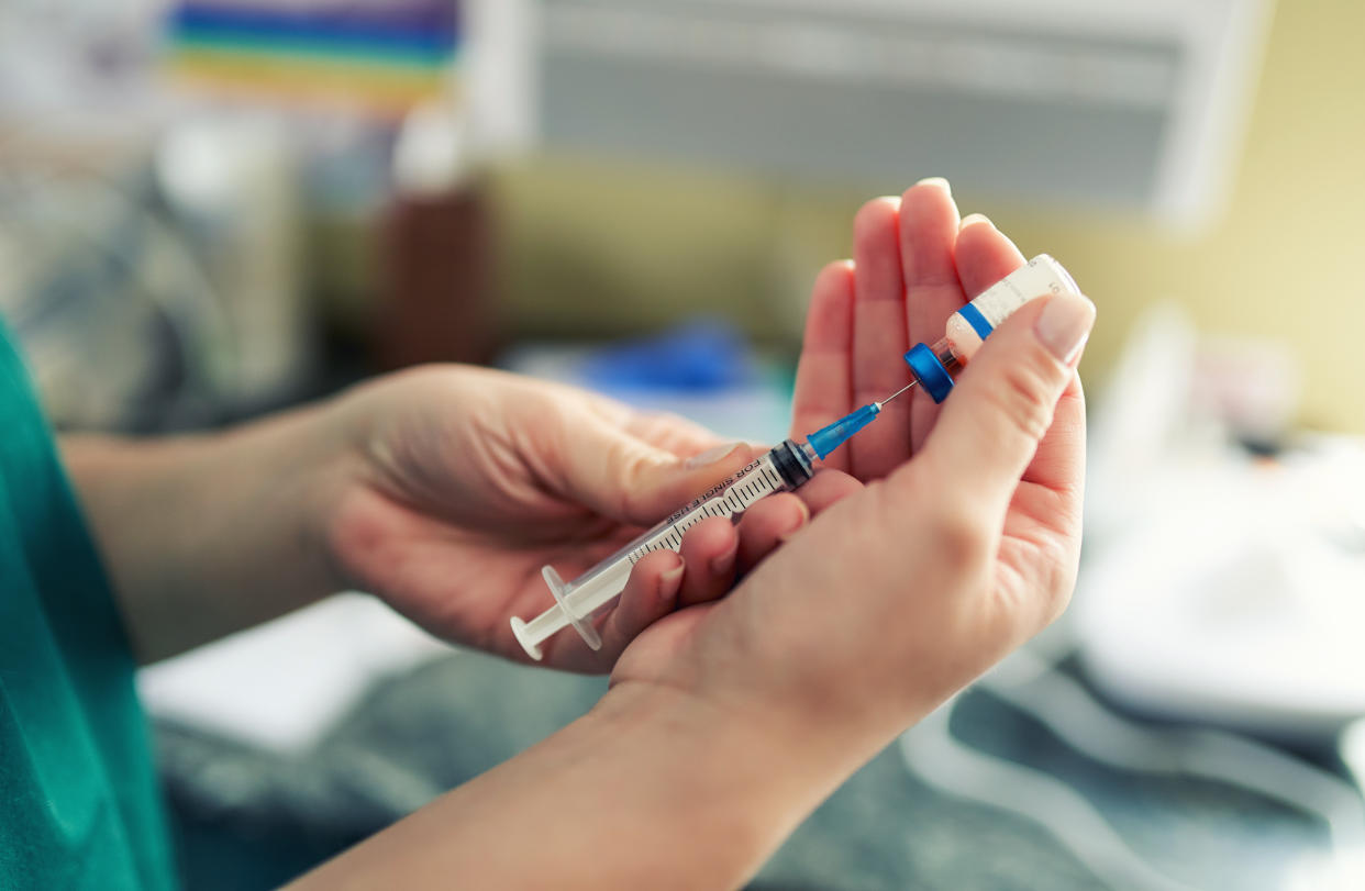 There are fundamental differences between HIV and SARS-CoV-2, the virus that causes COVID-19, that make developing a vaccine easier for one than for the other. (Photo: Sebastian Condrea via Getty Images)