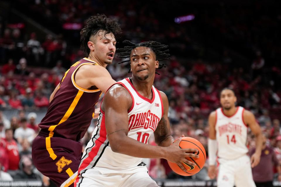 Jan 12, 2023; Columbus, Ohio, USA;  Ohio State Buckeyes forward Brice Sensabaugh (10) attempts to make a shot while guarded by Minnesota Golden Gophers forward Dawson Garcia (3) during the second half of the men’s NCAA division I basketball game between the Ohio State Buckeyes and the Minnesota Golden Gophers at Value City Arena. Mandatory Credit: Joseph Scheller-The Columbus Dispatch