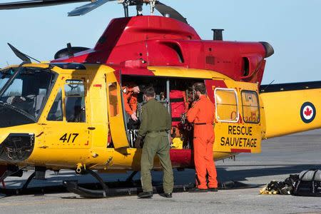 Members of 417 Combat Support Squadron prepare to depart for Fort McMurray as part of Operation LENTUS 2016 at 4 Hangar, 4 Wing Cold Lake, Alberta, Canada May 4, 2016. Cpl Manuela Berger/Canadian Armed Forces/Handout via REUTERS