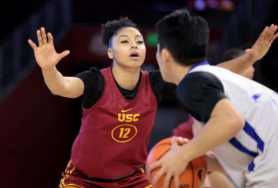 USC women's basketball player Juju Watkins defends during practice at the Galen Center Thursday.