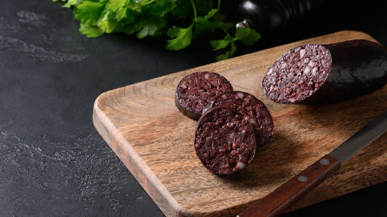 Black pudding on cutting board