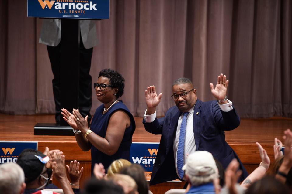 Augusta Mayor-elect Garnett Johnson and wife Toni Seals-Johnson stand for the crowd during the Warnock for Georgia rally at Augusta Technical College on Thursday, Sept. 1, 2022. Sen. Warnock, D-Ga., spoke on issues such as President Biden's recent student loan forgiveness and Georgia infrastructure.