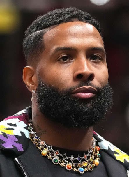 PHOTO: Odell Beckham Jr. walks court-side at the Miami Heat and the Washington Wizards NBA game, Nov 23, 2022, in Miami.  (Jasen Vinlove/USA TODAY Sports)