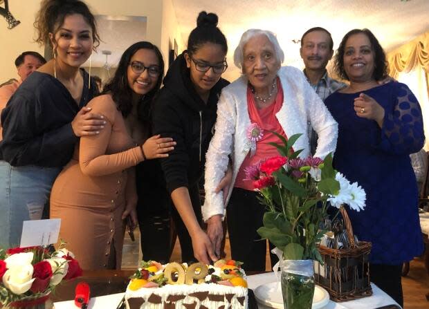 Naomi Charles, pictured here with her family on her 90th birthday, was diagnosed with COVID-19 in April 2020. She recovered from the infection but endured several care home lockdowns. She died on Feb. 22, 2021.