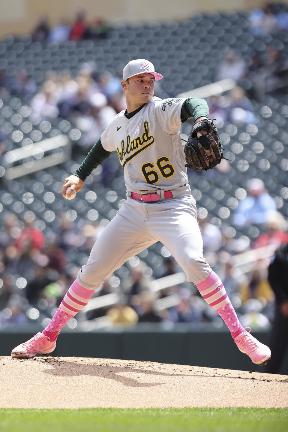 Oakland Athletics starting pitcher Daulton Jefferies (66) throws against the Minnesota Twins during the first inning of a baseball game, Sunday, May 8, 2022, in Minneapolis. (AP Photo/Stacy Bengs)