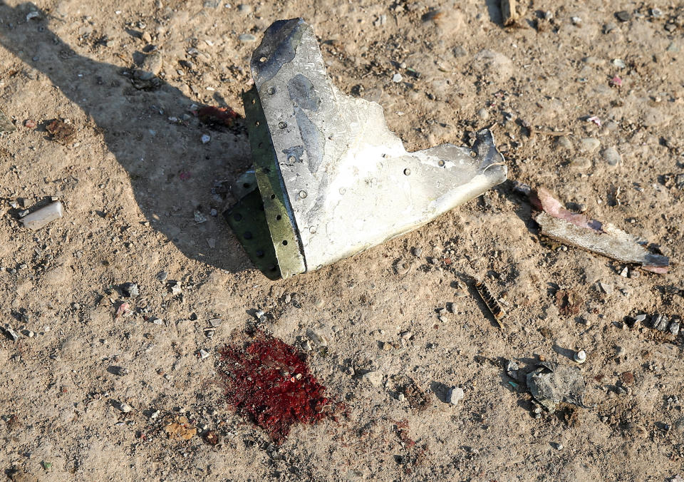 Blood stains are seen on the ground at the site where the Ukraine International Airlines plane crashed after take-off from Iran's Imam Khomeini airport, on the outskirts of Tehran, Iran January 8, 2020. (Photo: Nazanin Tabatabaee/WANA (West Asia News Agency) via Reuters)