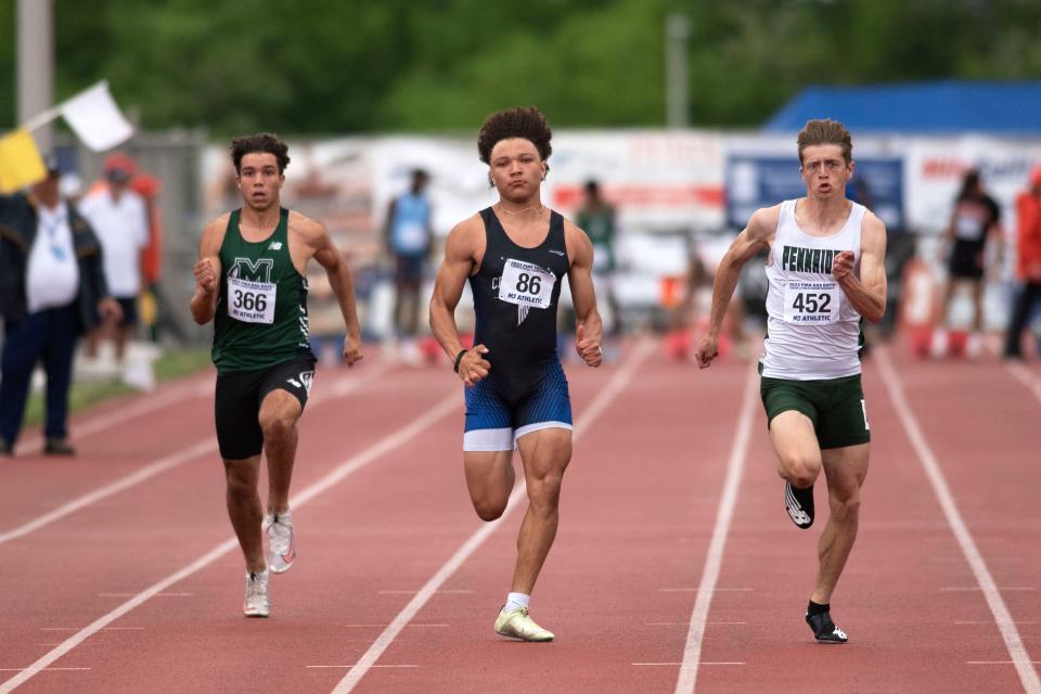 Cedar Crest's Gabe Lewis, center, and Pennridge's Joey Gant run boys 3A 100-meter dash prelims at PIAA Track and Field Championship at Shippensburg University on Friday, May 27, 2022. Lewis placed sixth with 10.94 seconds while Gant placed first with 10.78.