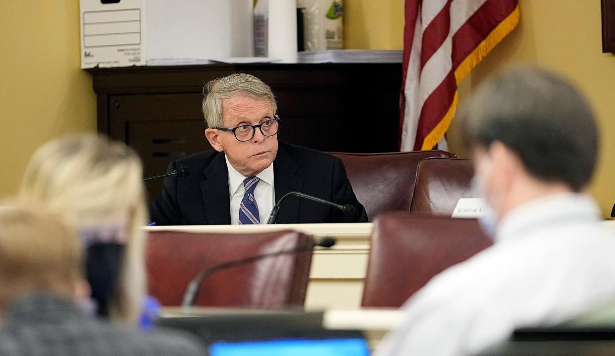 Gov. Mike DeWine speaks during an Ohio Redistricting Commission meeting at the Ohio Statehouse Tuesday.