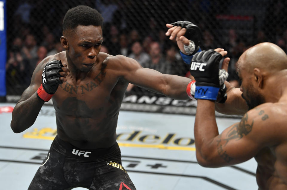 LAS VEGAS, NEVADA - MARCH 07: (L-R) Israel Adesanya of Nigeria battles Yoel Romero of Cuba in their UFC middleweight championship fight during the UFC 248 event at T-Mobile Arena on March 07, 2020 in Las Vegas, Nevada. (Photo by Jeff Bottari/Zuffa LLC)