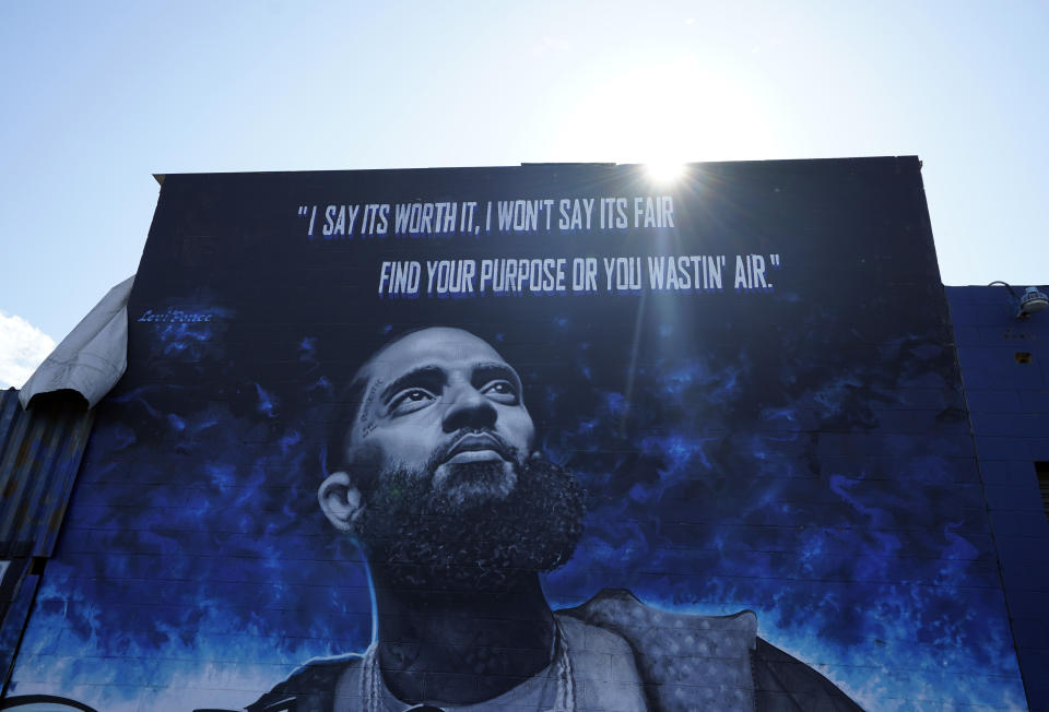 A street mural of the late rapper Nipsey Hussle is pictured, Thursday, June 30, 2022, in the Boyle Heights section of Los Angeles. The many murals of Hussle around Los Angeles speak to the late rapper's lasting legacy. (AP Photo/Chris Pizzello)