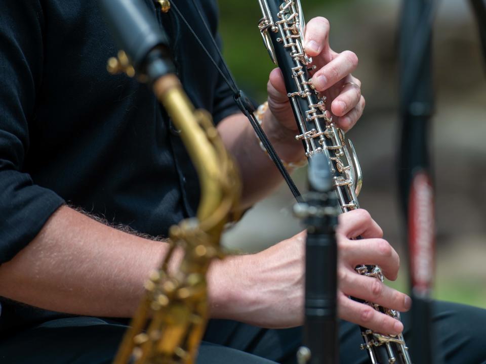 A close-up shot as clarinetst Doug Owens plays during the  Jackson Symphony's "Symphony on the Move" performance outside the Jackson-Madison County Library on Monday, Jun. 12, 2023. on Monday, Jun. 12, 2023. 