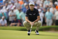 Will Zalatoris lines up a putt on the 14th hole during the first round of the PGA Championship golf tournament, Thursday, May 19, 2022, in Tulsa, Okla. (AP Photo/Eric Gay)