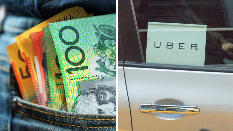 Money and Uber sign in car.