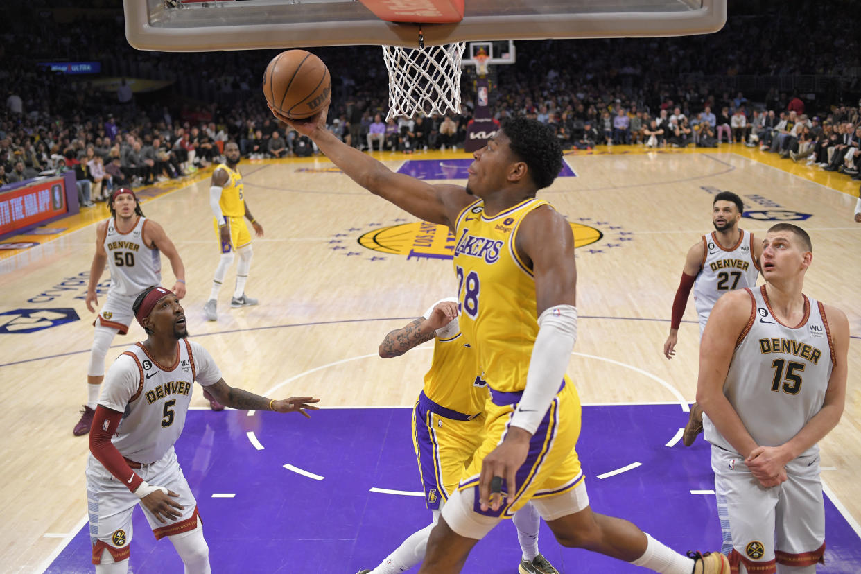 Los Angeles Lakers forward Rui Hachimura scores against the Denver Nuggets in the second half of Game 4 of the NBA basketball Western Conference Final series Monday, May 22, 2023, in Los Angeles. (AP Photo/Mark J. Terrill)