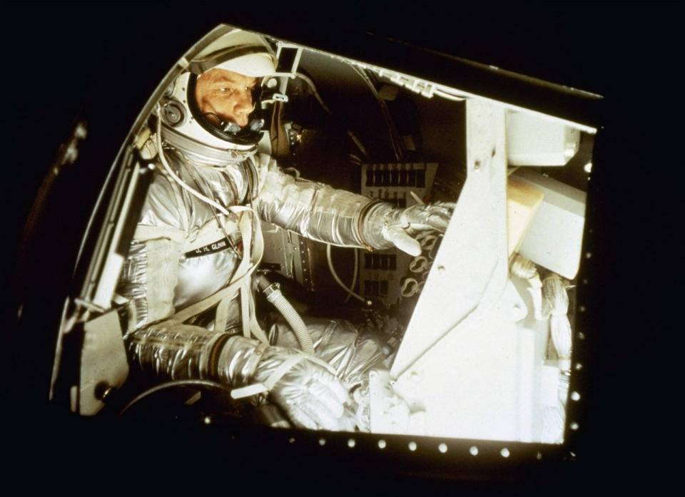 <p>NASA's Mercury astronaut, John Glenn sits inside the training capsule, Jan. 11, 1961, in preparation for manned space flight. (AP Photo/Harvey Georges)</p>