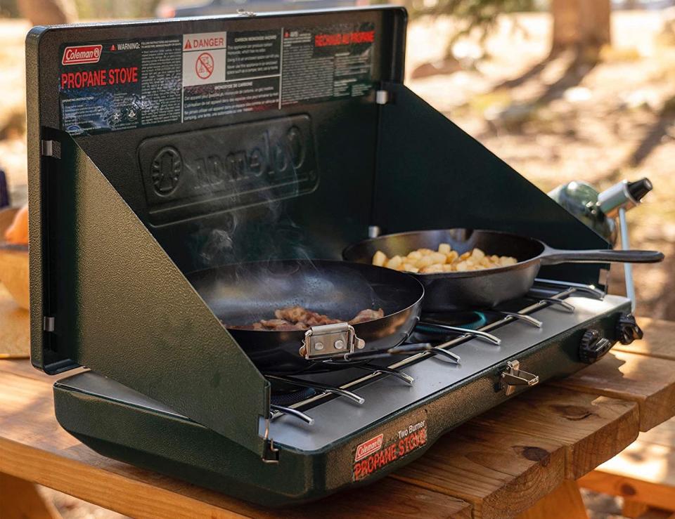 Save big on Coleman outdoor essential, like the 2-Burner Propane Stove. Image via Amazon.