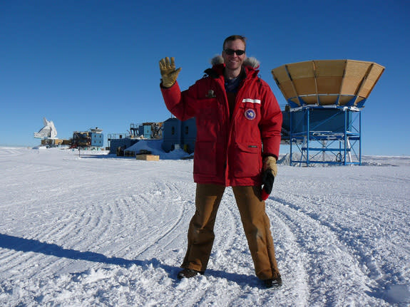 John Kovac, of the Harvard-Smithsonian Center for Astrophysics, in front of the Keck Array (right) and BICEP2 telescope (left), with the South Pole Telescope in the background (far left).