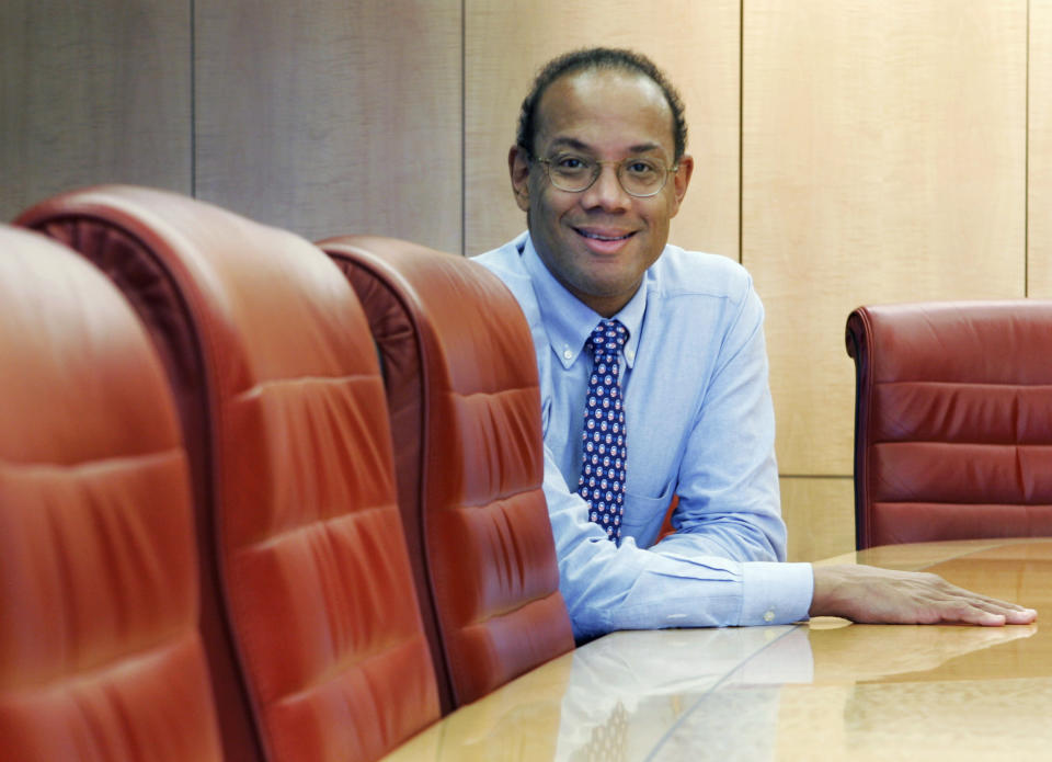 John Rogers, chairman, founder, and CEO of Ariel Capital Management poses in his Chicago office Tuesday, Feb. 12, 2008. The money management firm established Ariel Community Academy in 1996, a school that promotes financial literacy and give kids money to invest. At a time when pensions are being phased out and people must rely more on their own investment smarts, Rogers thinks saving and investment should be an integral part of the curriculum at schools across the country. (AP Photo/Charles Rex Arbogast)