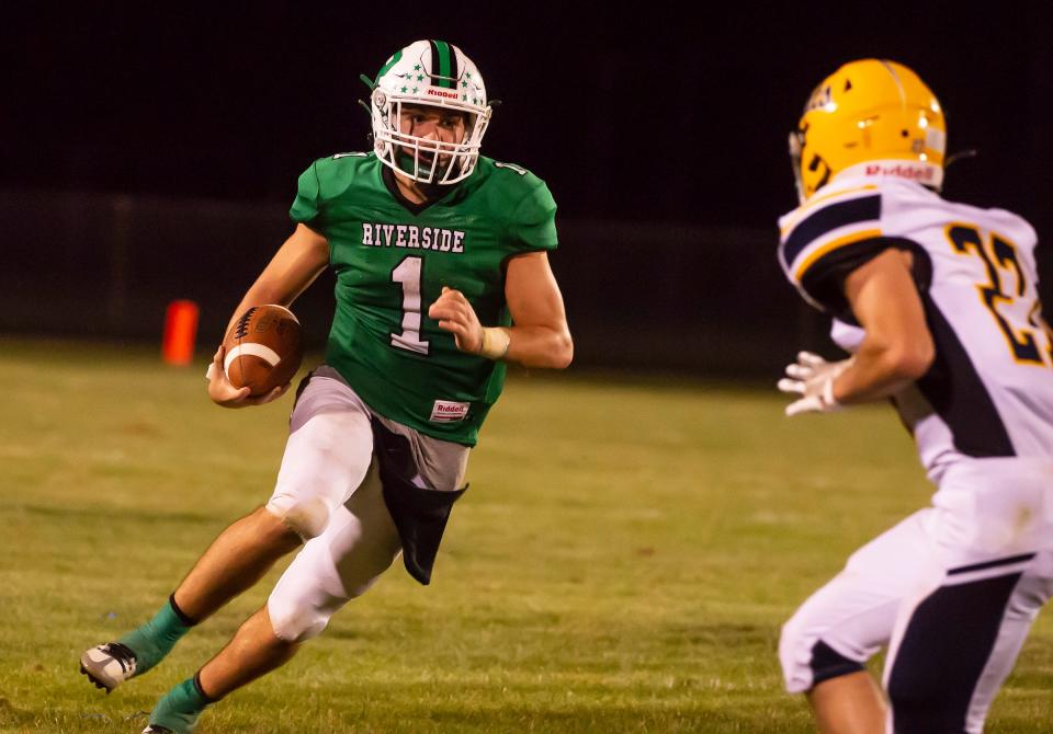 Riverside QB Sam Hughes used his feet more than his arm to beat Shenango Friday at Riverside High School.  [Lucy Schaly/For BCT]