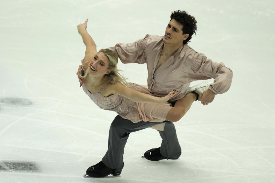 Bronze medalists Canada's Piper Gilles and Paul Poirier compete in the Ice Dance Final for the ISU Grand Prix of Figure Skating Final held in Beijing, Saturday, Dec. 9, 2023. (AP Photo/Ng Han Guan)