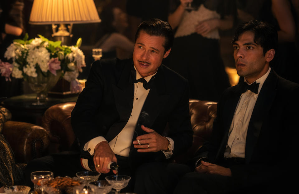 Brad Pitt plays Jack Conrad and Diego Calva plays Manny Torres in 'Babylon.'