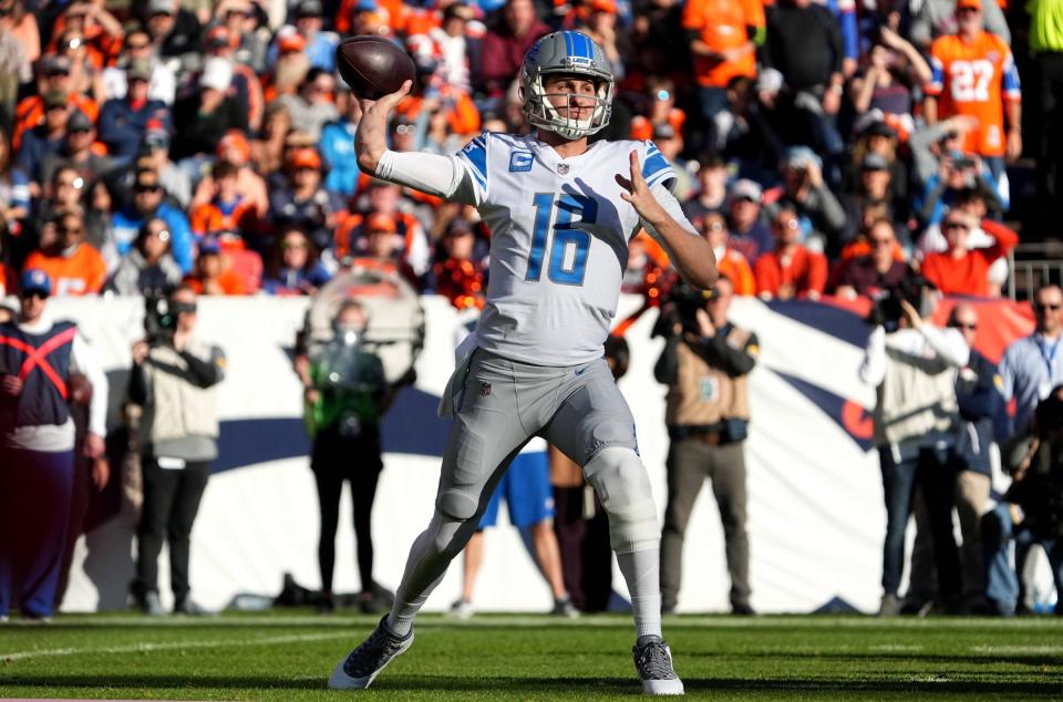 Detroit Lions quarterback Jared Goff (16) passes in the first quarter against the Denver Broncos at Empower Field at Mile High on Dec. 12, 2021.