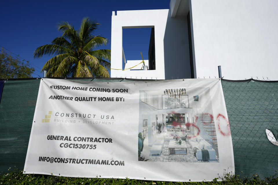 A new home is under construction in the Miami neighborhood of Coconut Grove, Friday, April 5, 2024. Historically Black West Coconut Grove is a majority Black neighborhood hidden among some of the most affluent areas in Miami that once boomed with sports and economics. Today, few remnants of that proud Black heritage exist. (AP Photo/Lynne Sladky)