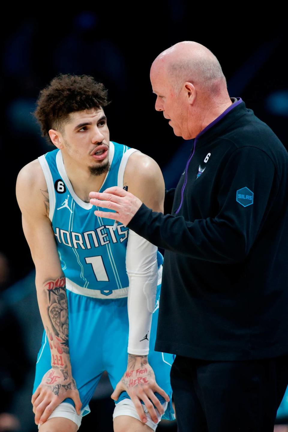 Charlotte Hornets head coach Steve Clifford talks to guard LaMelo Ball (1) during the second half of a February game against the San Antonio Spurs at Spectrum Center. The Hornets won 120-110.