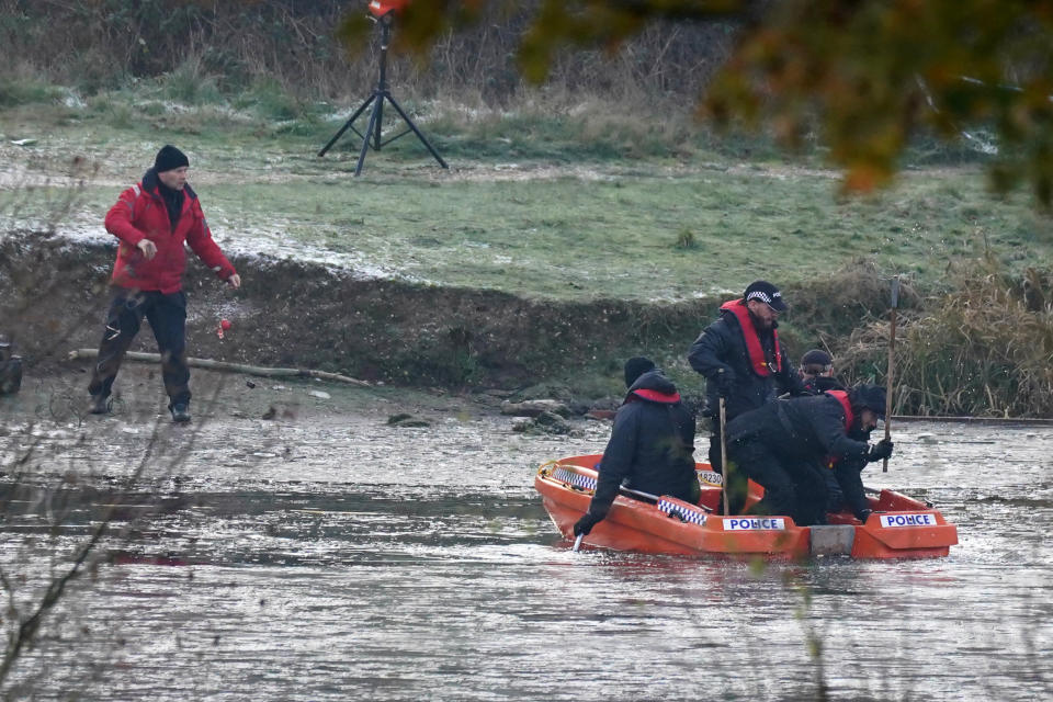 Police break the ice on the lake at Babbs Mill Park in Kingshurst, after the deaths of three boys aged eight, 10 and 11 who fell through ice into the lake in the West Midlands. Picture date: Tuesday December 13, 2022. (Photo by Jacob King/PA Images via Getty Images)