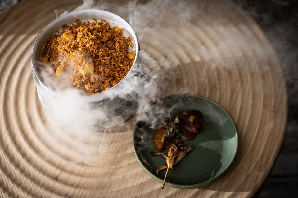 Ile Bistro Jollof Rice smoking presentation dish