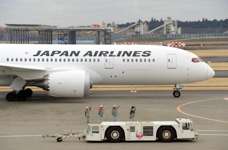 A plane taxis on the tarmac at Narita International Airport in Japan, on January 15, 2014