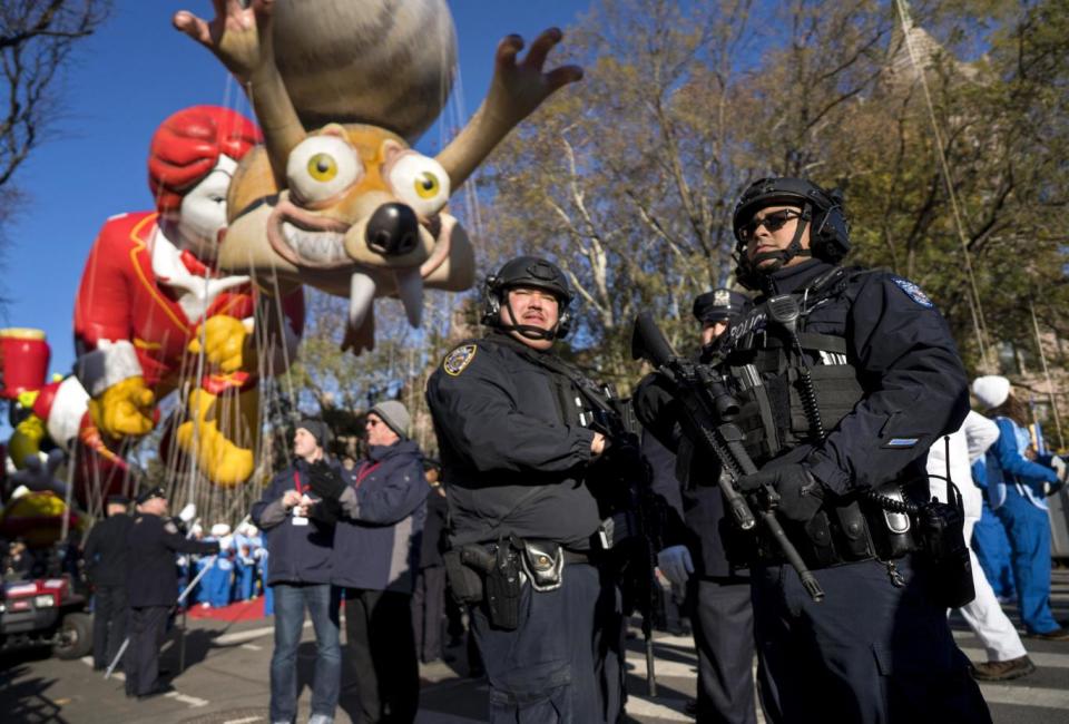 Heavily-armed members of the New York Police Department take a position (AP)