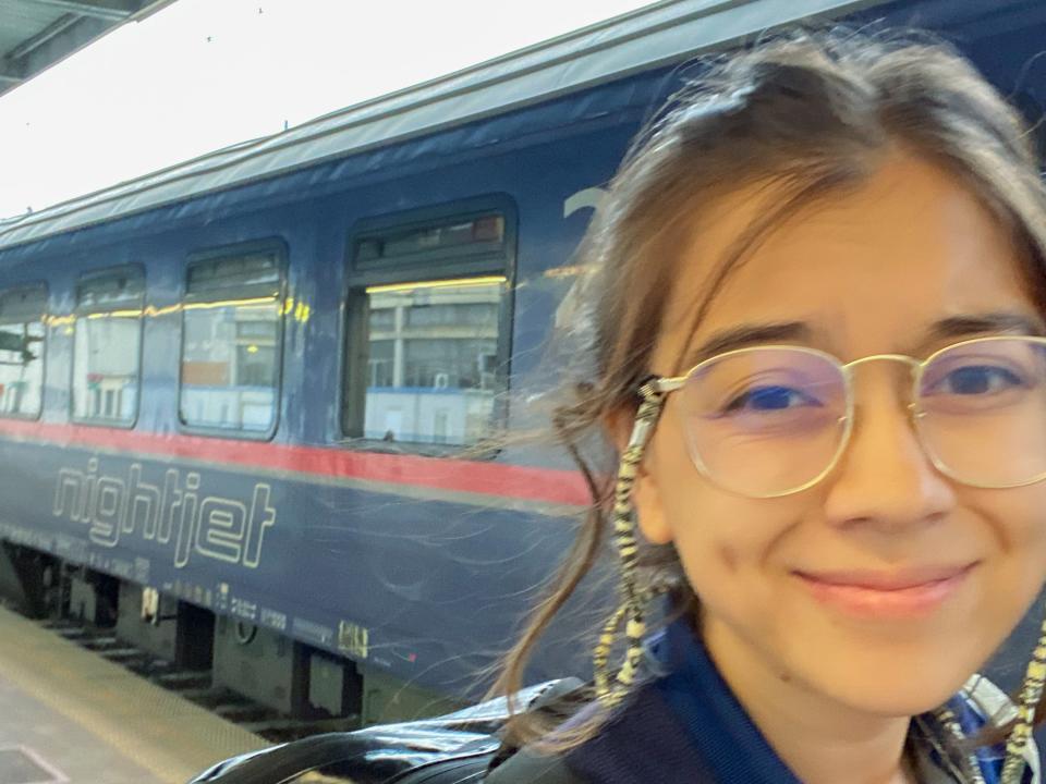 The author takes a selfie outside the train
