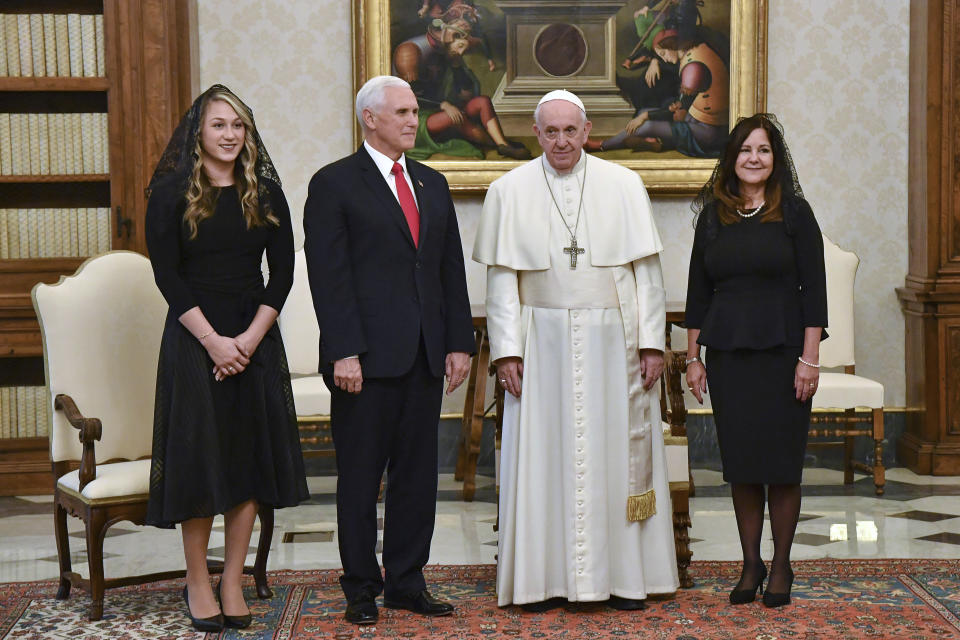 Pope Francis poses for a photograph with US Vice President Mike Pence, second from left, his wife Karen, right, and their daughter in law Sarah, on the occasion of their private audience, at the Vatican, Friday, Jan. 24, 2020. Pence told Pope Francis, “You made me a hero" back home by granting him a private audience at the Vatican on Friday. (Alessandro Di Meo/Pool Photo via AP)